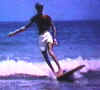Mike rides the wild surf in New Smyrna, 1968.JPG (60184 bytes)
