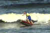 Skipper cranks a bottom turn in the choppy Florida surf.JPG (40322 bytes)