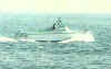 The Bay Watch lifeguard boat cruises by Malibu.JPG (38899 bytes)